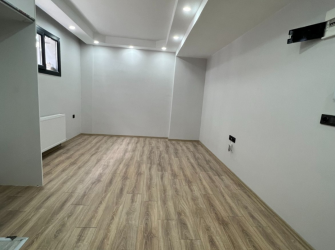 Güngören Haznedar'da 1+1 Açık Mutfaklı 50 m2 Bahçe Katı 