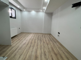 Güngören Haznedar'da 1+1 Açık Mutfaklı 50 m2 Bahçe Katı 