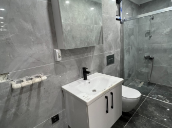 Güngören Haznedar'da 1+1 Açık Mutfaklı 50 m2 Bahçe Katı 